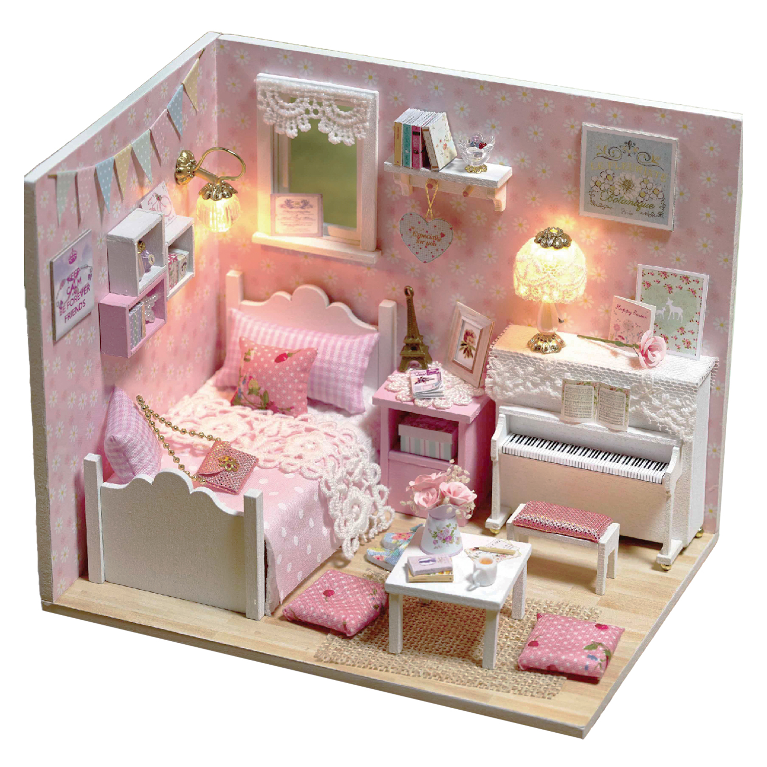 Una camera da letto rosa per casa delle bambole con letto, pianoforte, tavolo e decorazioni.