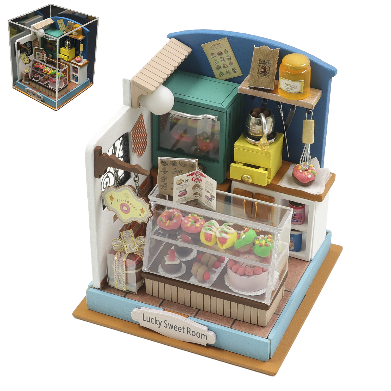 Panificio in miniatura con esposizione di torte e pasticcini. Cartello "Lucky Sweet Room".