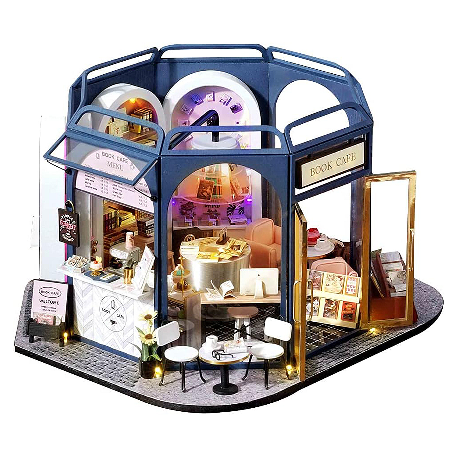 Un mini caffè-libreria con tavoli, sedie, macchina del caffè e libri.
