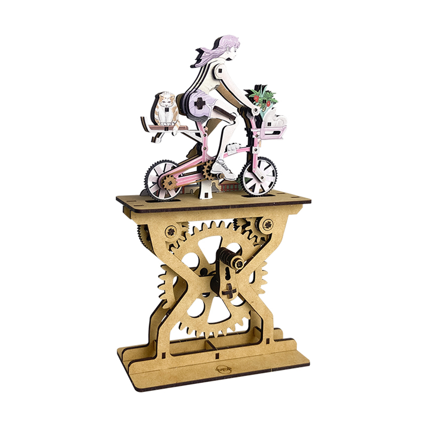 Modello in legno di una donna in bicicletta con gatto e fiori su un supporto a ingranaggi.