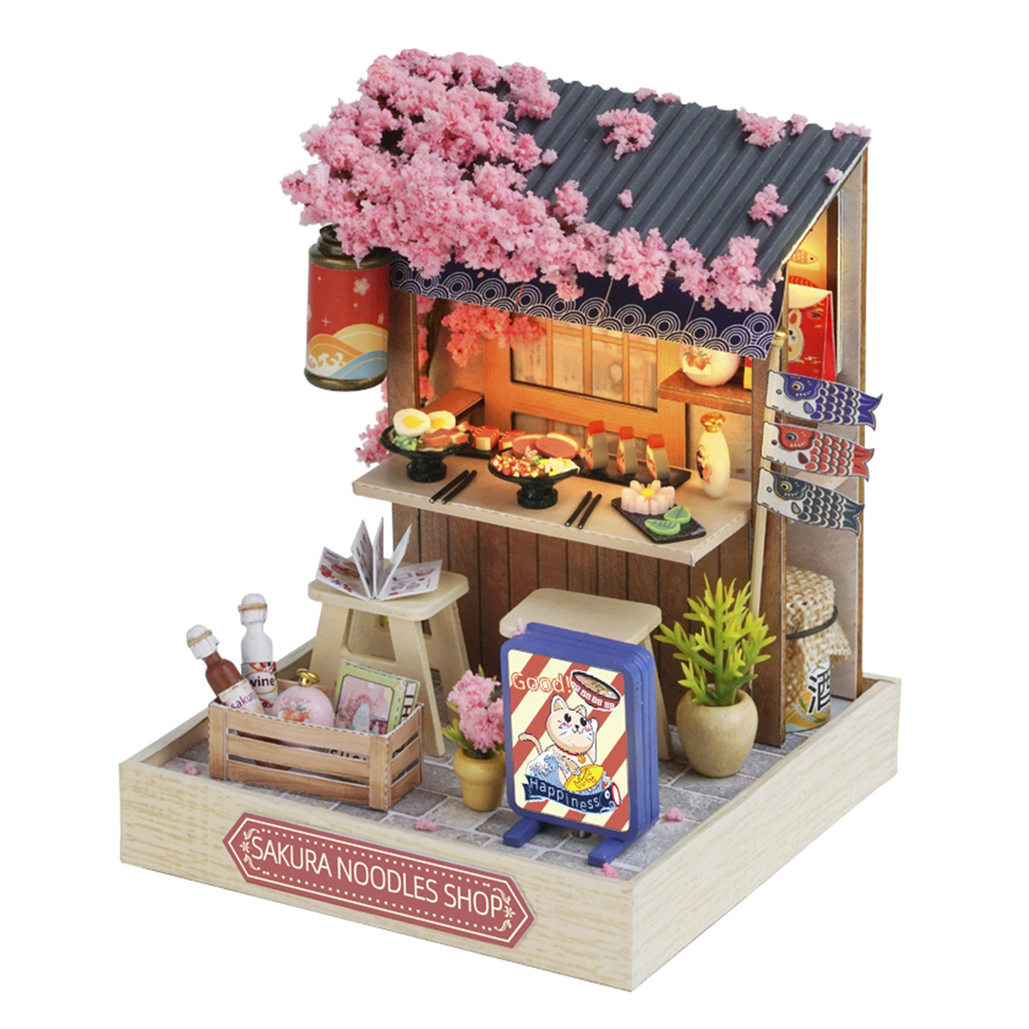 Negozio di noodle in miniatura con fiori di ciliegio, sushi e insegna.