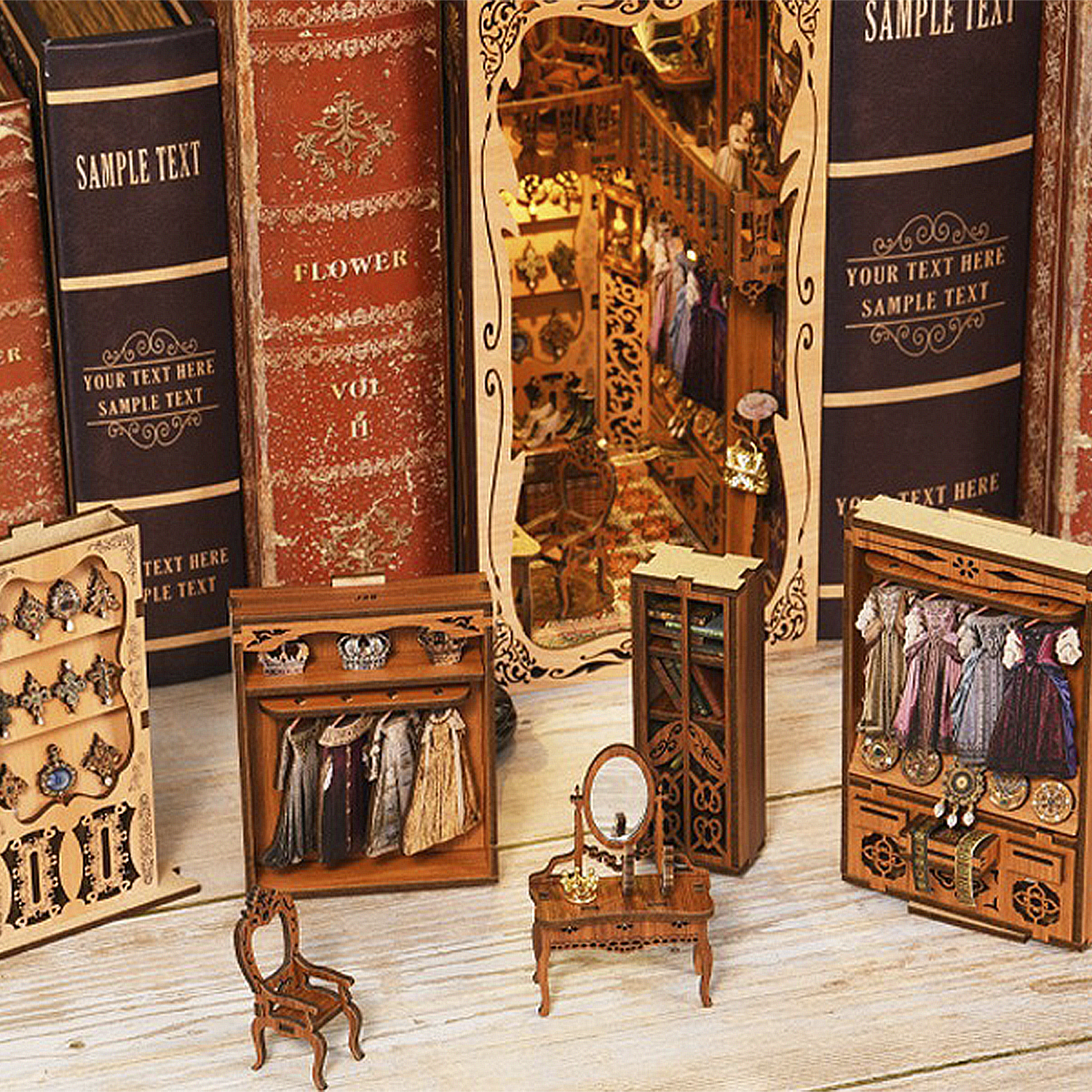 Mobili in miniatura: armadio, toeletta con specchio, sedia e libri.