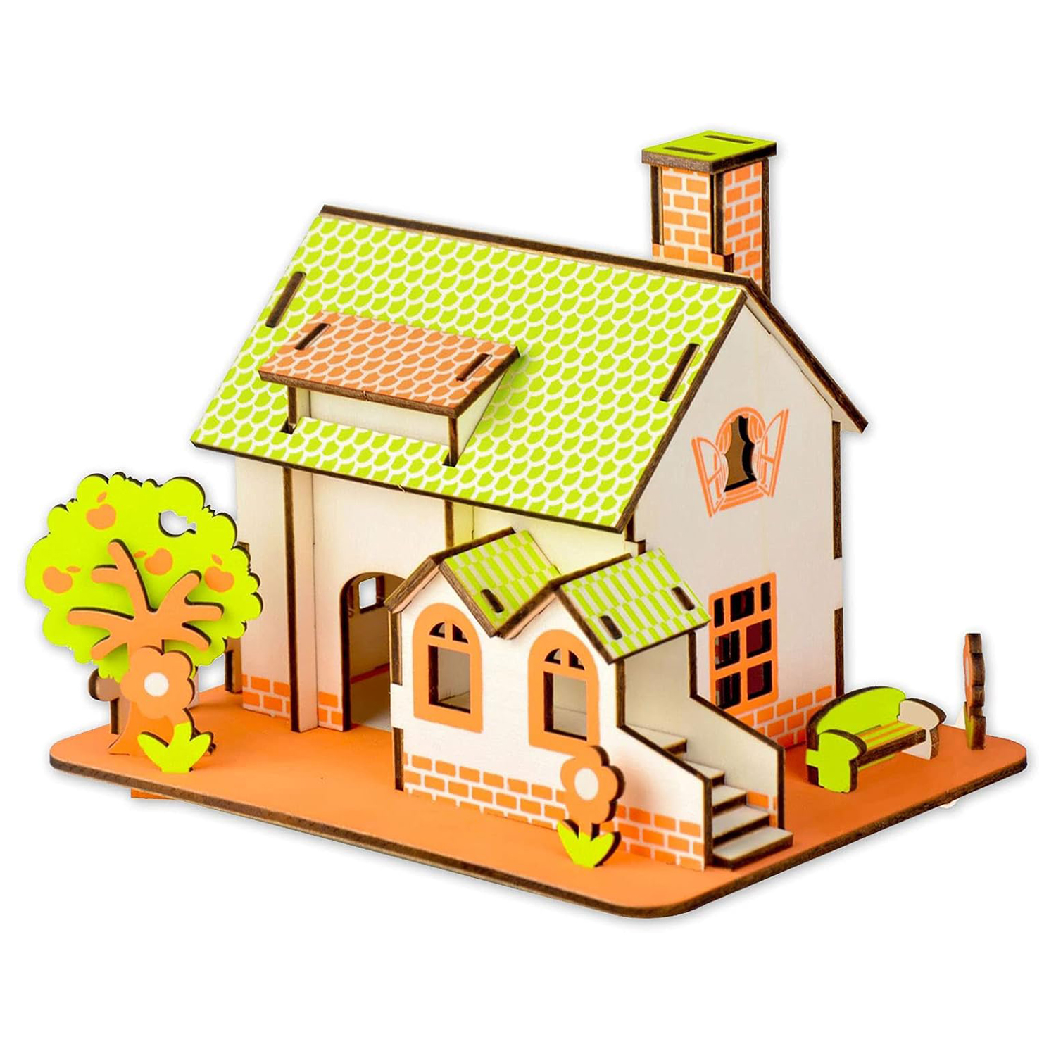 Modello di casa in legno con tetto verde, albero e mobili da giardino.