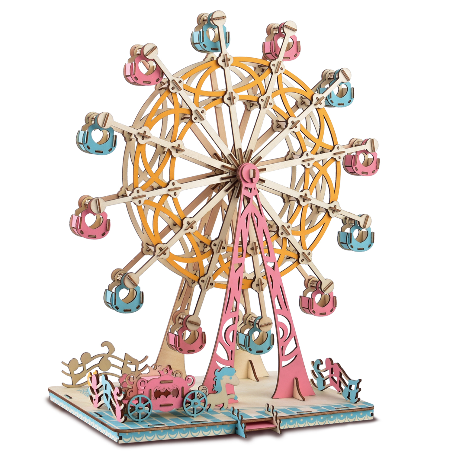 Un modello in legno di ruota panoramica con gondole rosa e blu su base decorata.