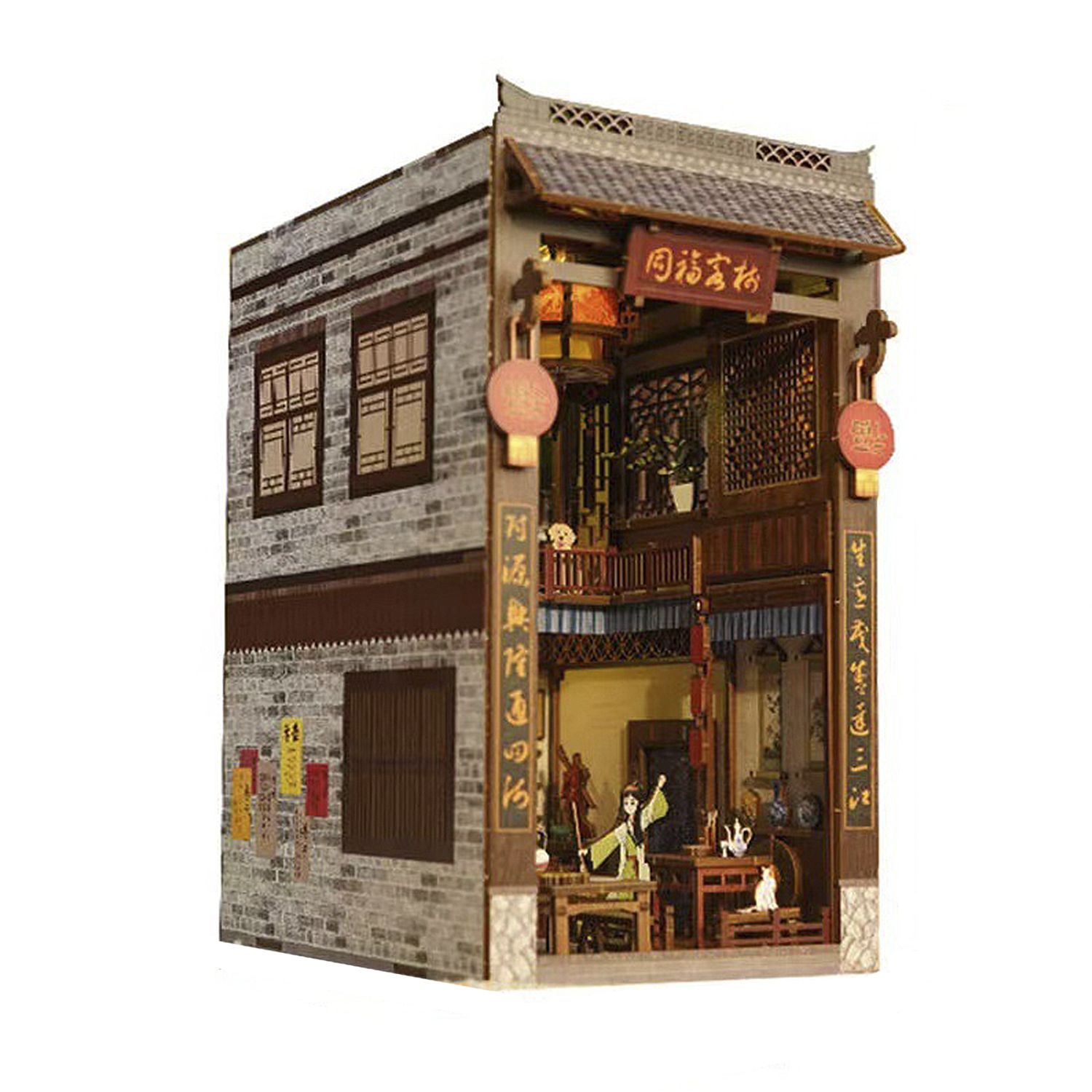 Casa in miniatura con architettura tradizionale cinese e figure.
