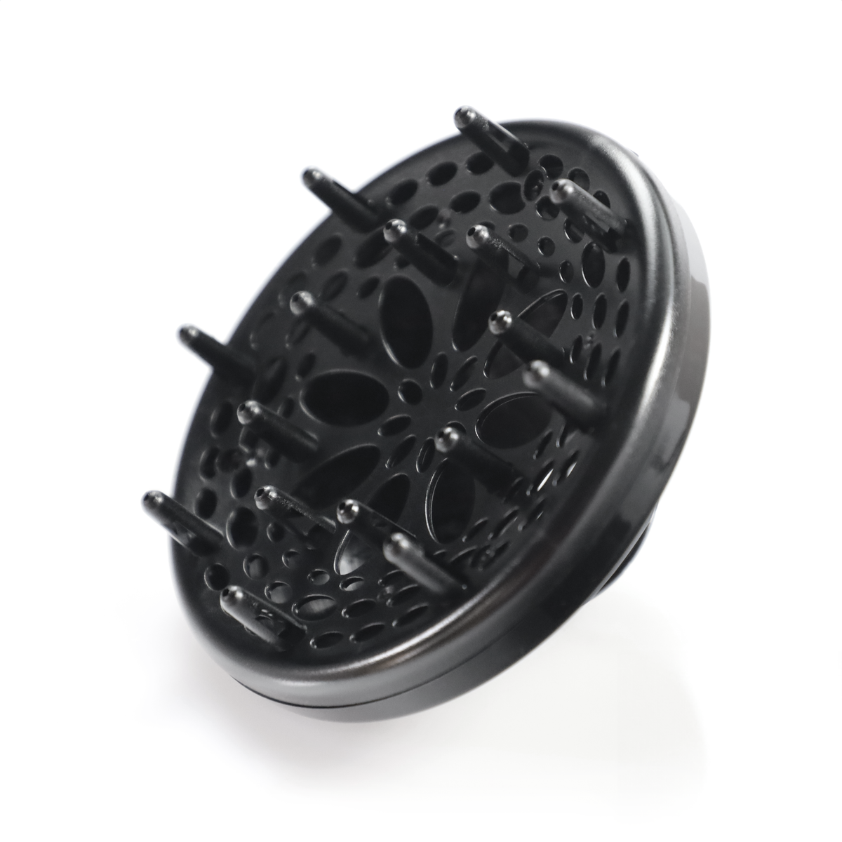 Czarny dyfuzor do suszarki z bolcami i okrągłymi wycięciami na białym tle.