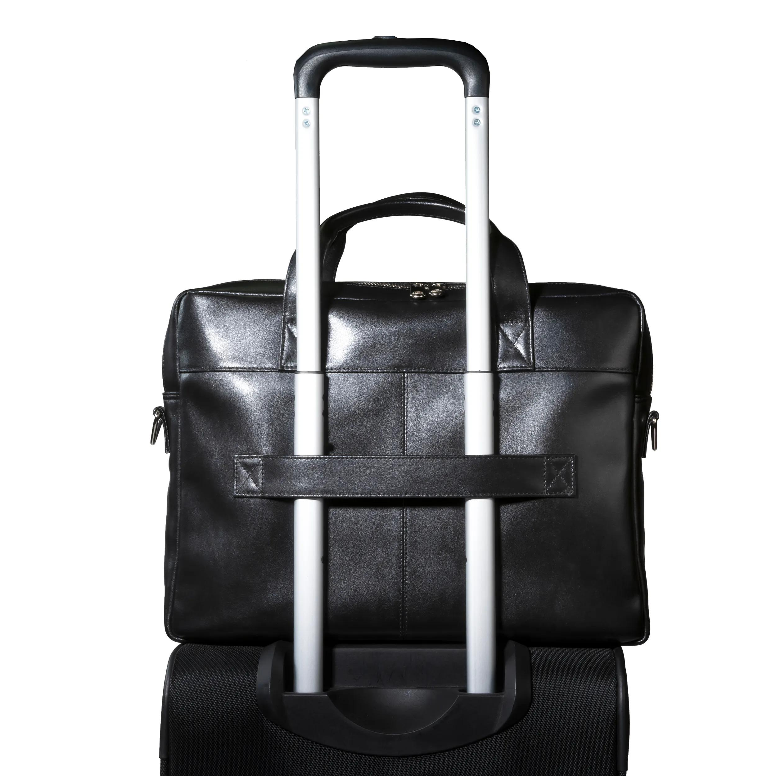 Maletín negro de cuero sobre un trolley negro con asa extensible.