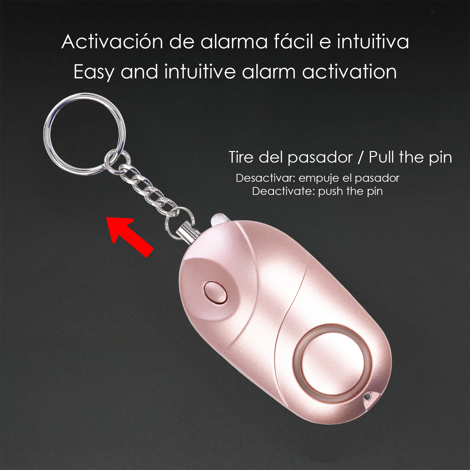 Una alarma personal dorada con llavero y flecha roja apuntando al pasador.