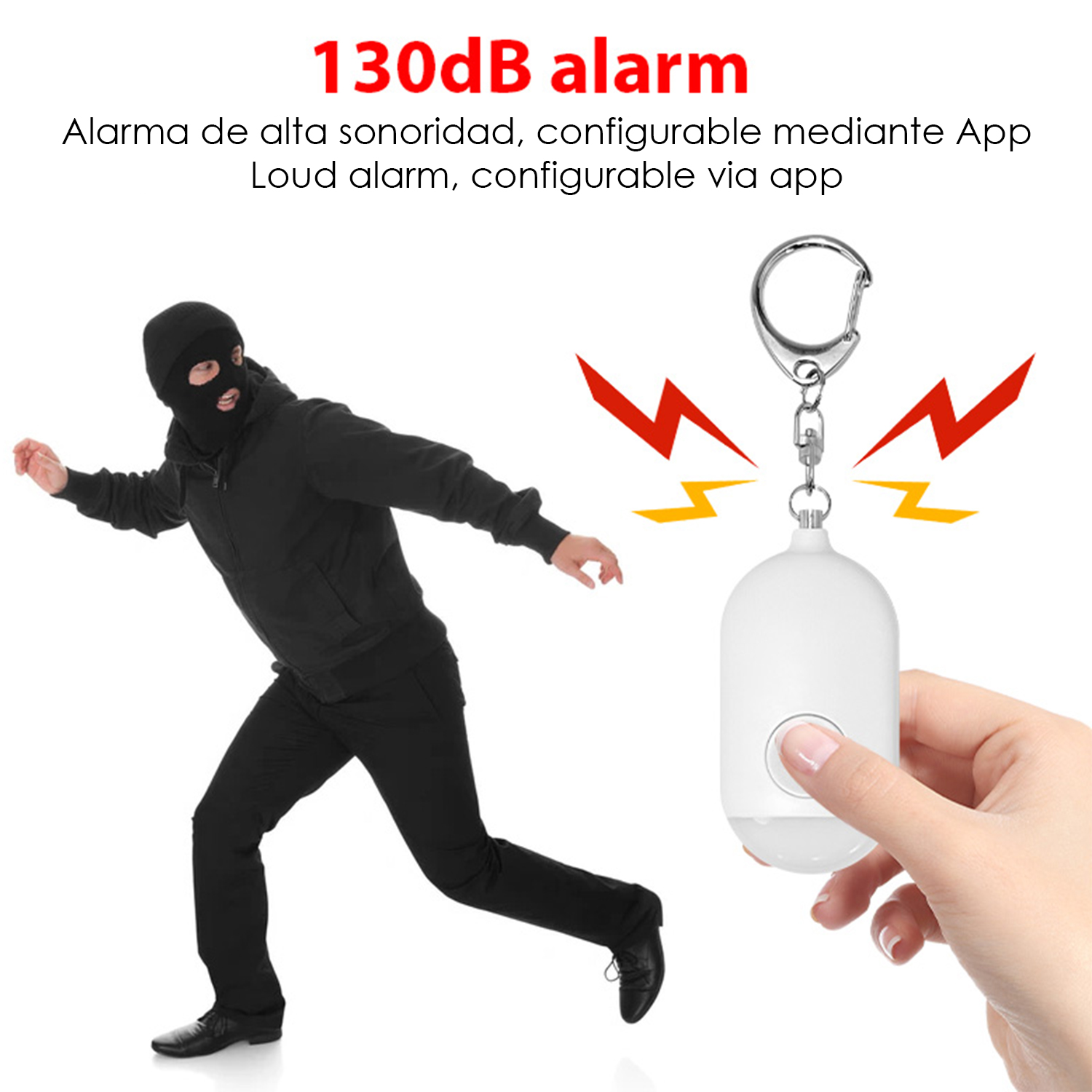 Un hombre de negro con pasamontañas, mano sujetando un llavero de alarma blanco.
