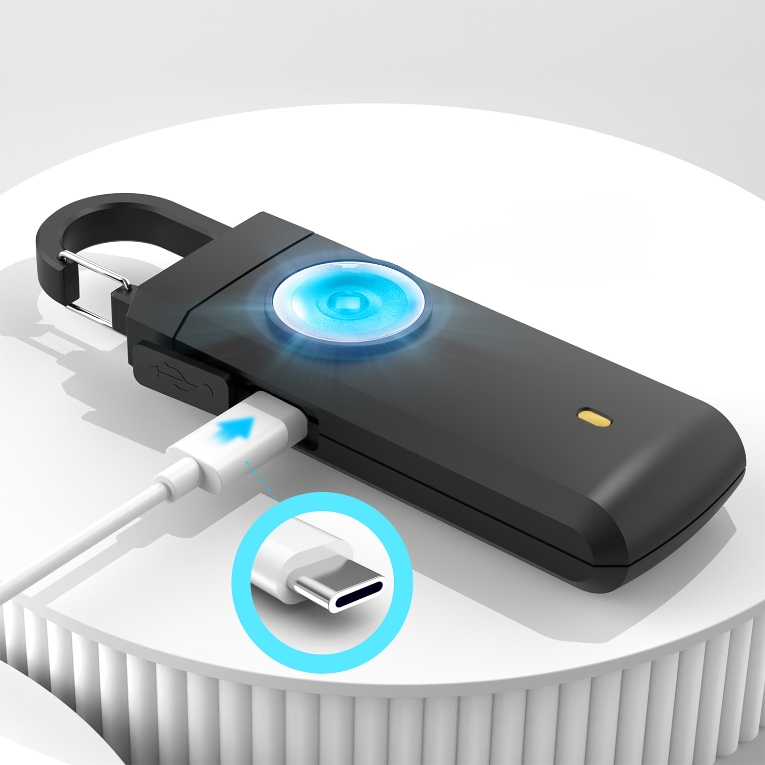 Dispositivo negro con luz azul y cable USB-C conectándose.
