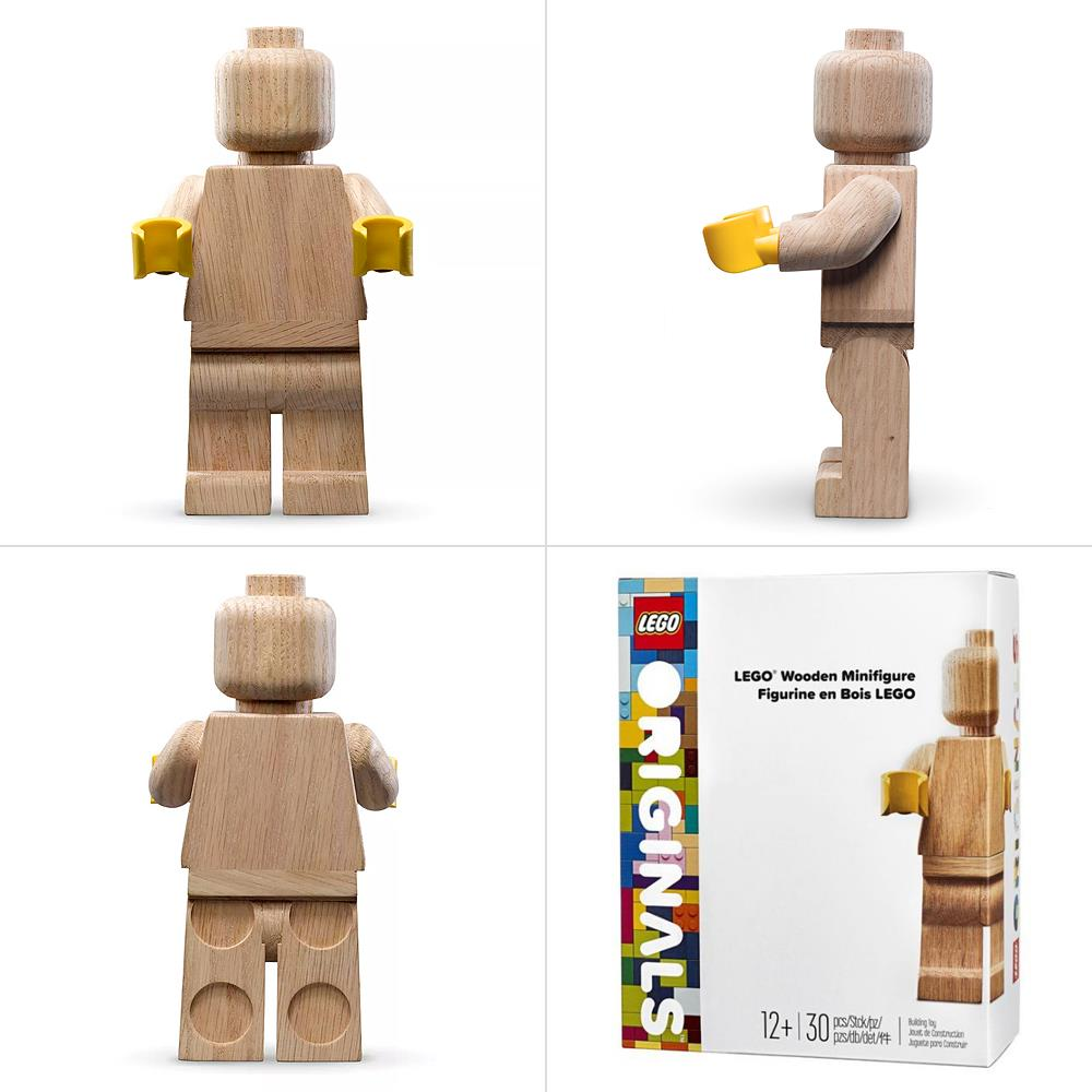 Una minifigure LEGO in legno con mani gialle davanti a una scatola.