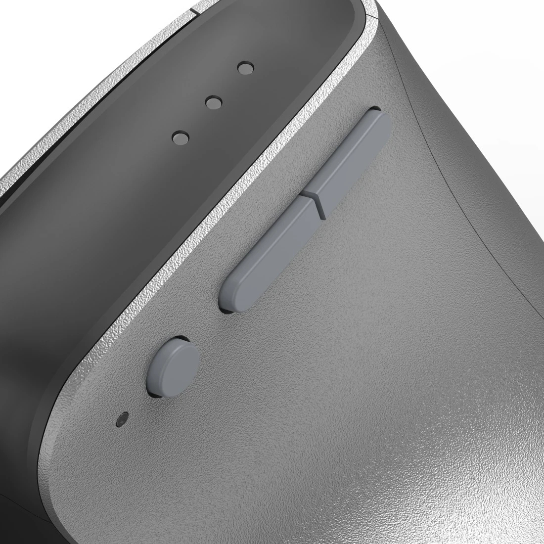 Zbliżenie szarego etui ładującego z trzema wskaźnikami LED i przyciskami.