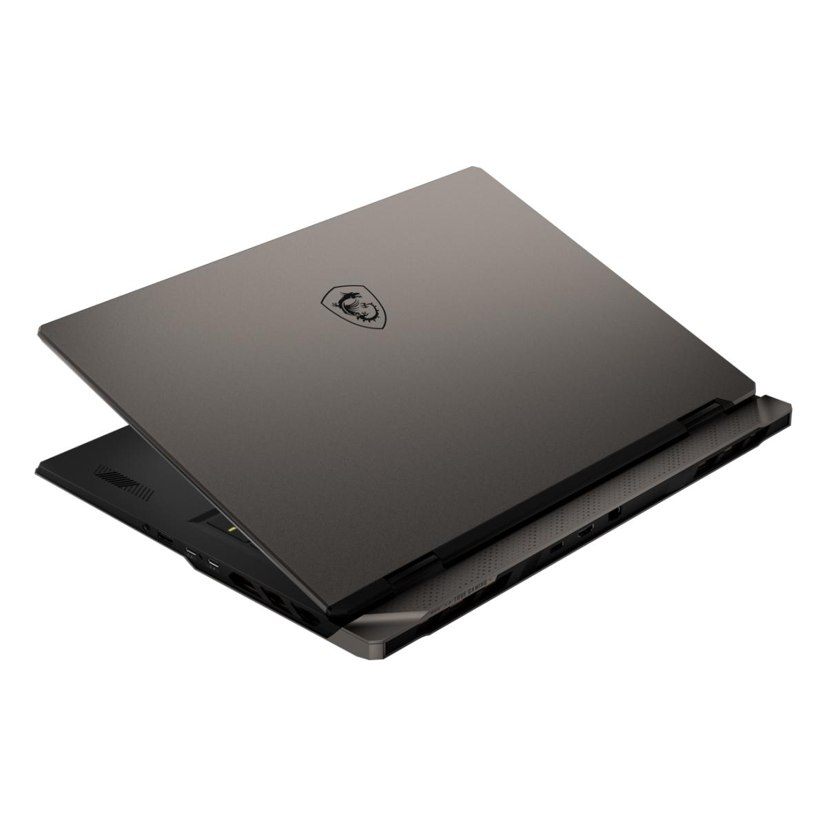 Geschlossener dunkelgrauer Laptop mit MSI-Logo auf dem Deckel, auf weißem Hintergrund.
