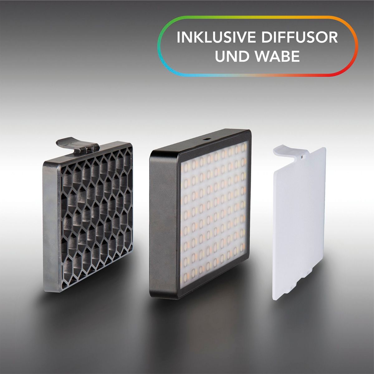 Ein schwarzes LED-Licht mit Waben-Diffusor und weißem Diffusor.