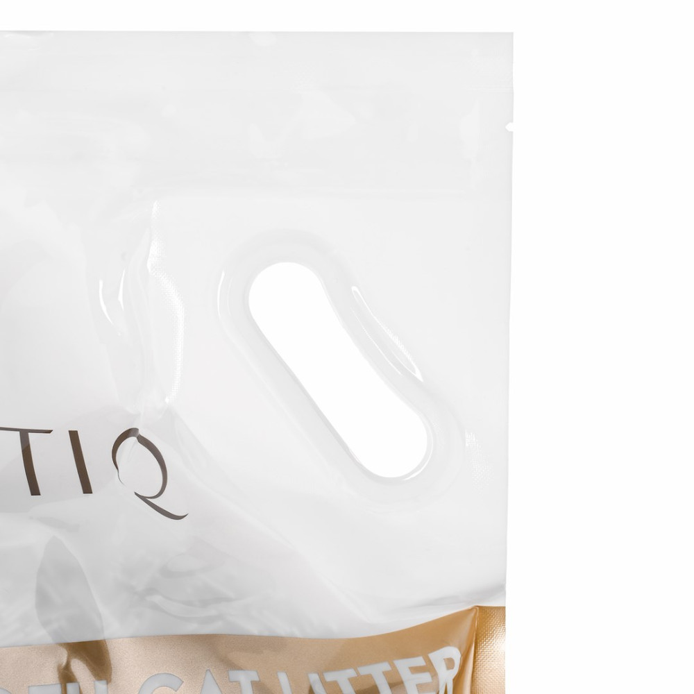 Biała torba z wycięciem na uchwyt i napisem 'TIQ'.