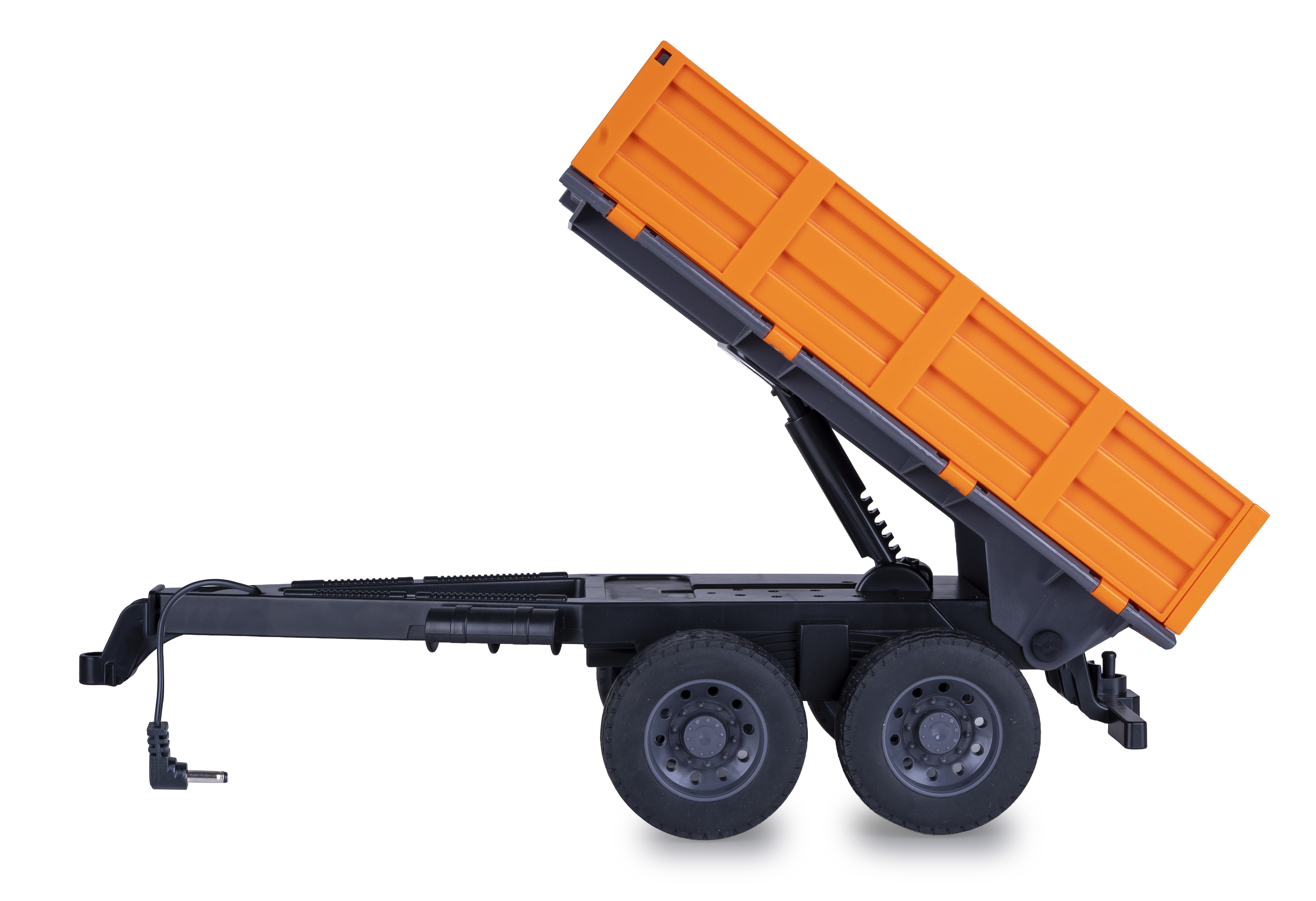 Ein kippbarer orangefarbener Anhänger mit schwarzen Rädern und Chassis.