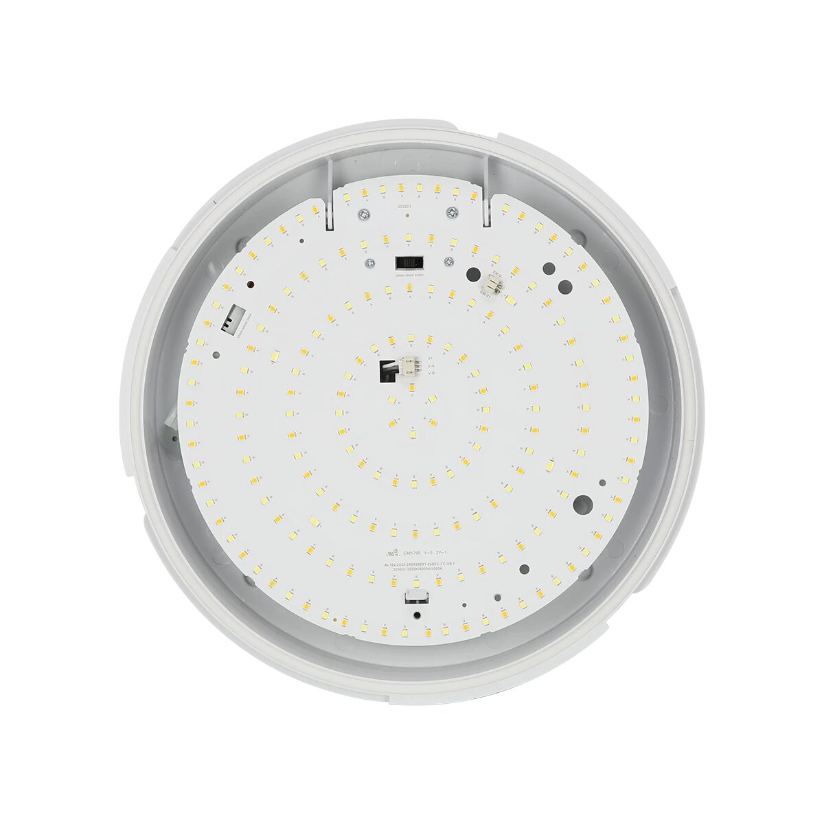 Eine weiße Deckenleuchte mit vielen kleinen LEDs auf einer Leiterplatte.