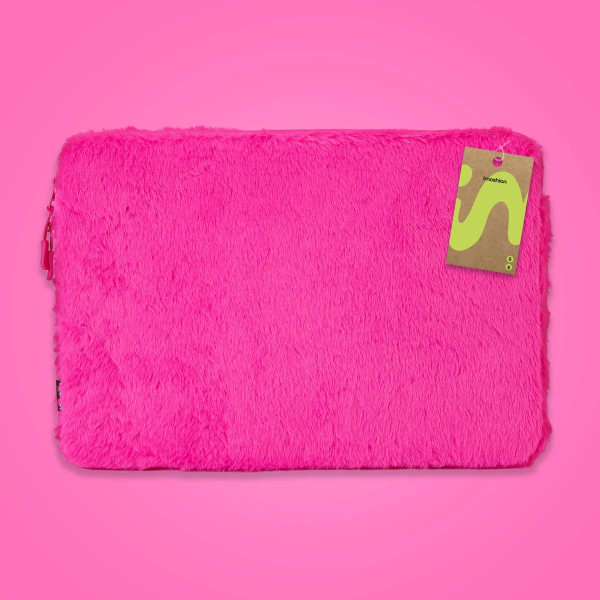 A fuzzy, hot pink laptop sleeve with a brown tag attached.