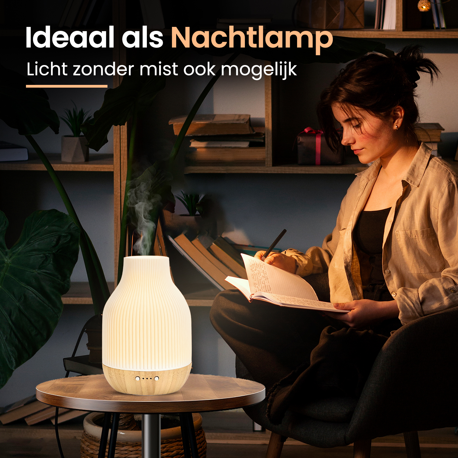 Een diffuser geeft stoom af. Een vrouw zit ernaast te lezen.