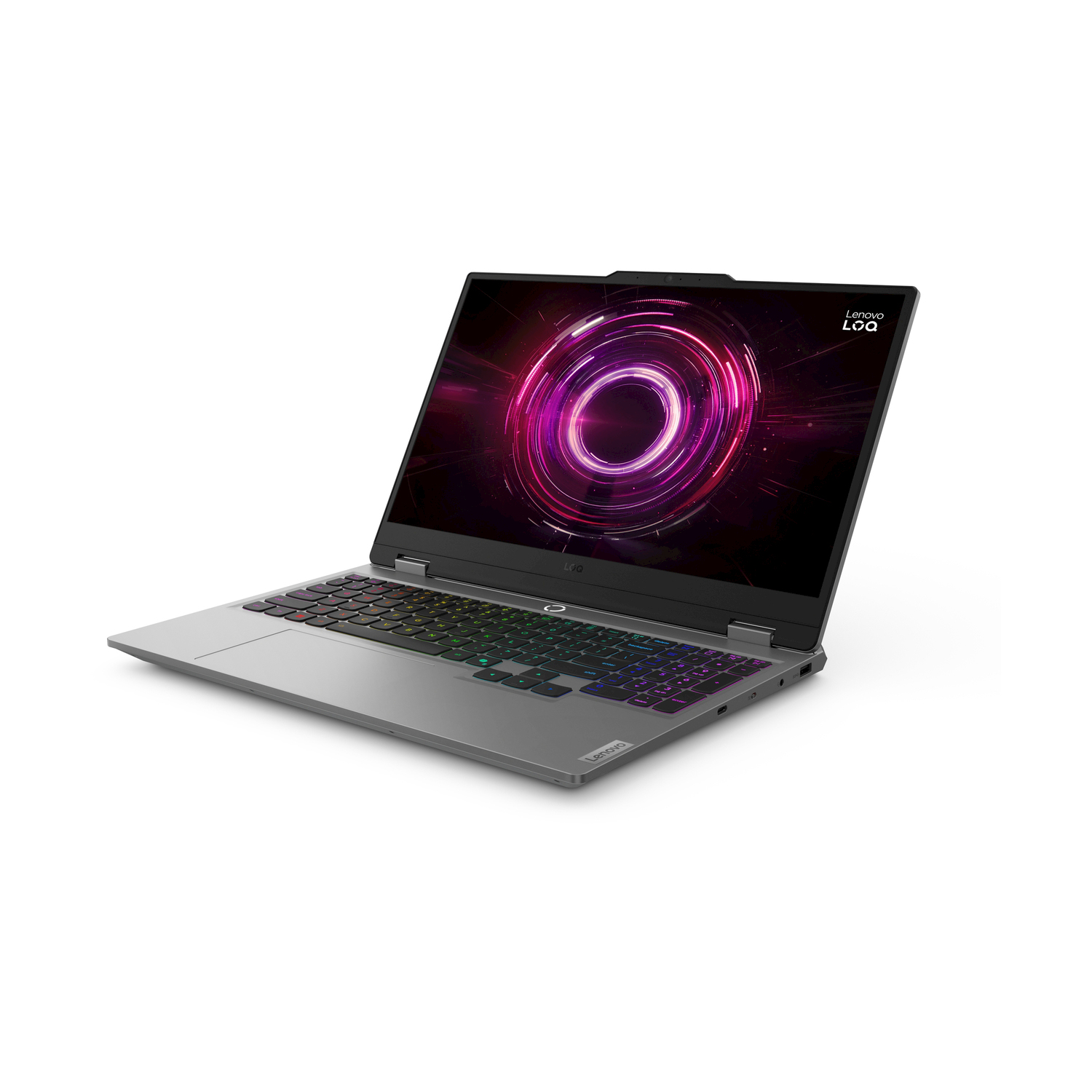 Laptop grigio con tastiera illuminata e sfondo rosa dello schermo.
