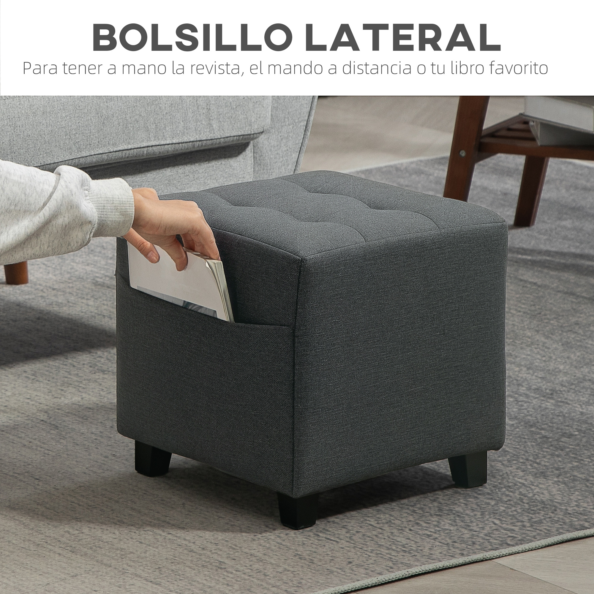 Un taburete gris con un bolsillo lateral que sostiene una revista.