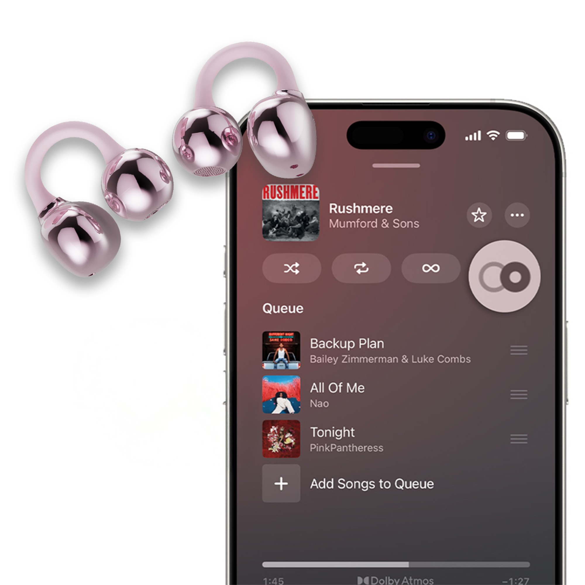 Müzik kuyruğu gösteren bir akıllı telefonun yanında pembe kulaklıklar.