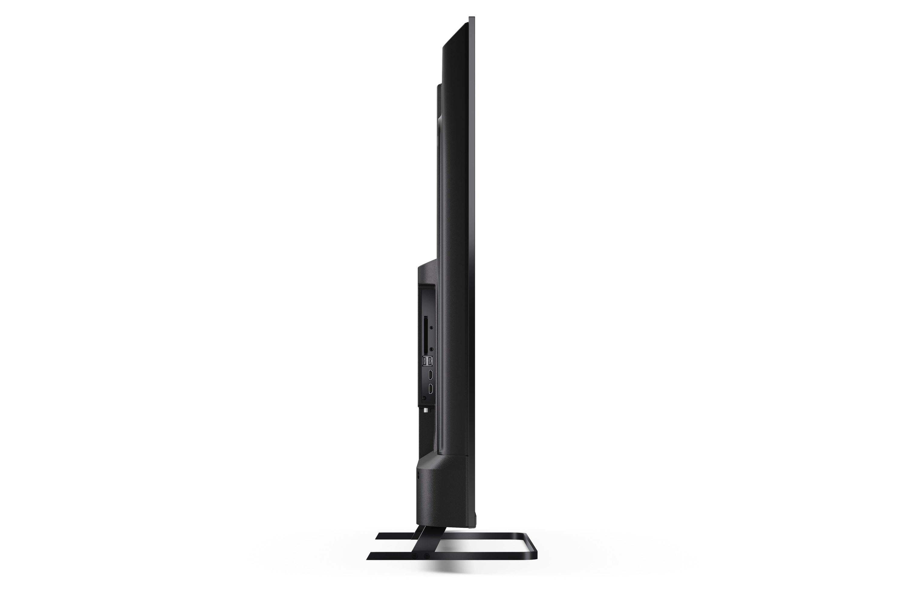 Schwarzer Fernseher von der Seite mit Anschlüssen und Standfuß.