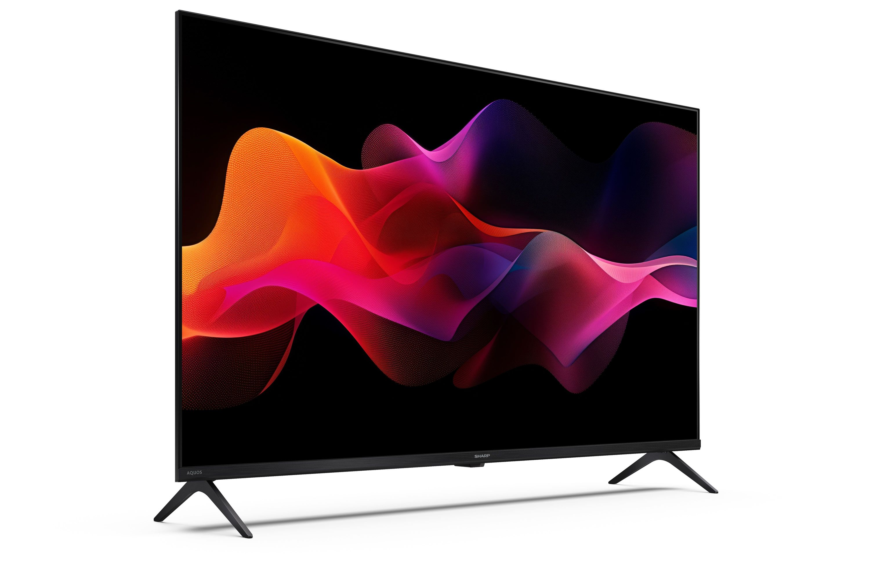 Un televisore moderno con motivo a onde colorate su sfondo nero.