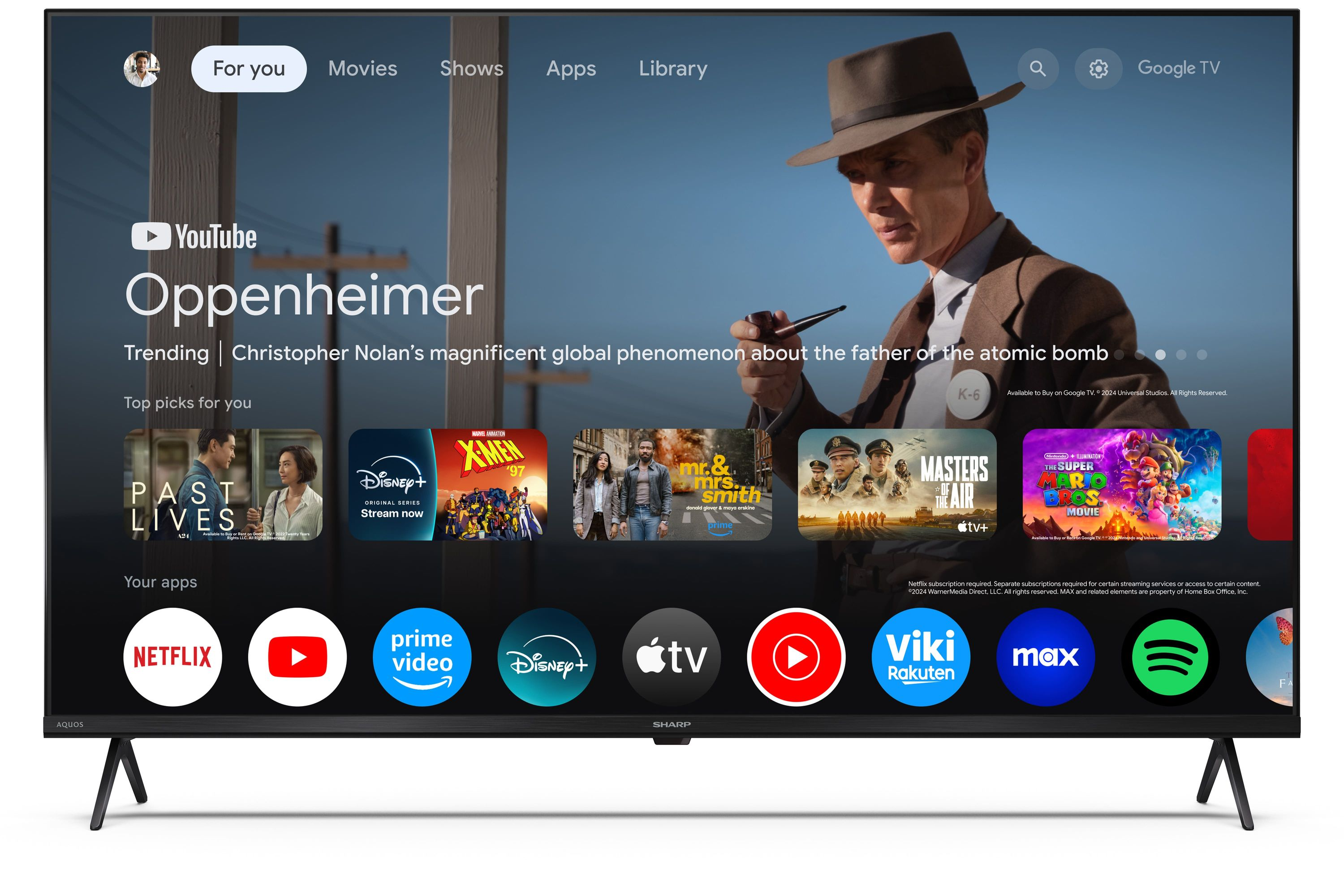 Página de inicio de Google TV con tráiler de Oppenheimer e íconos de apps.