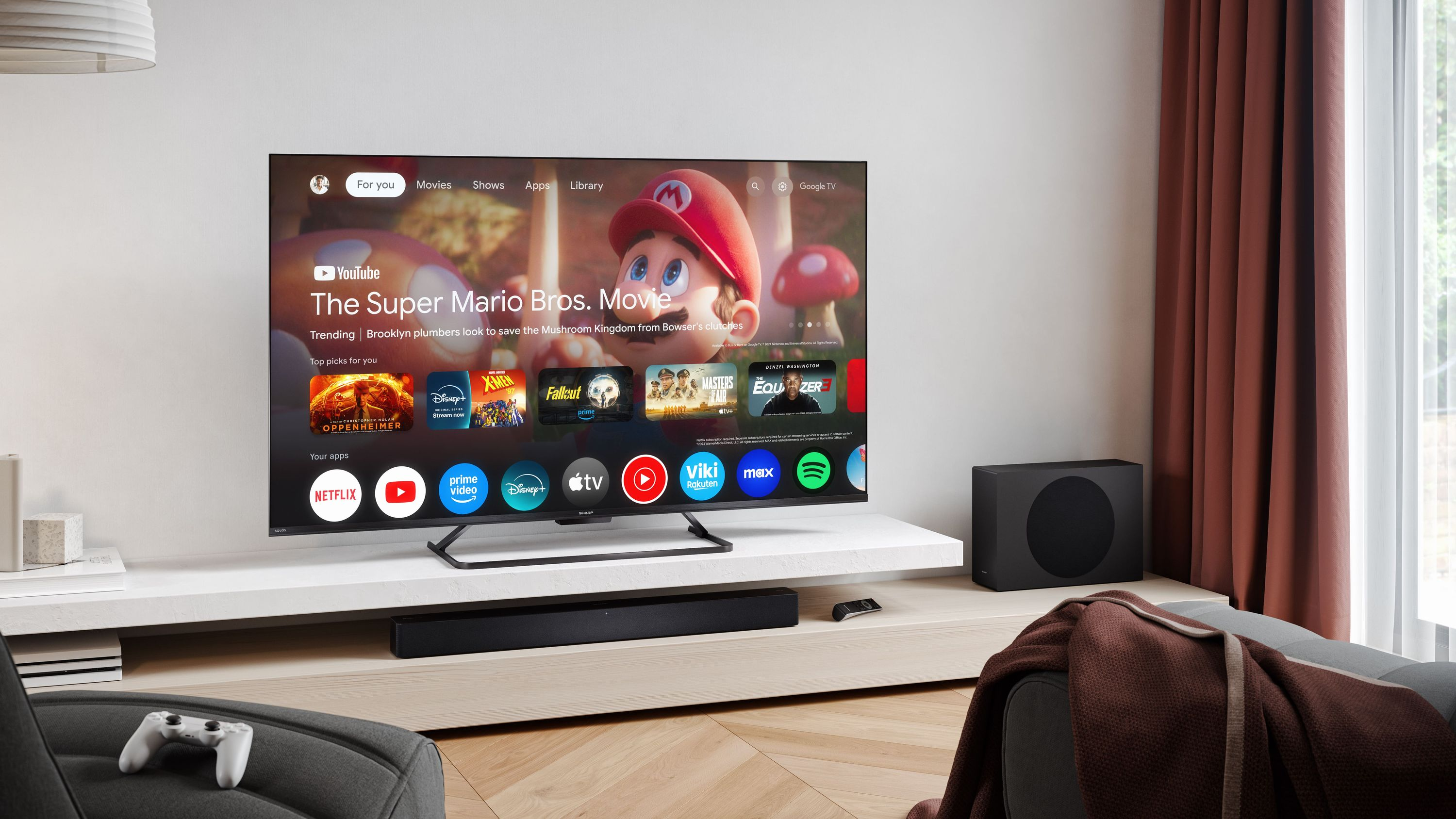 Ein moderner Fernseher mit Google TV, zeigt den Super Mario Bros. Film.
