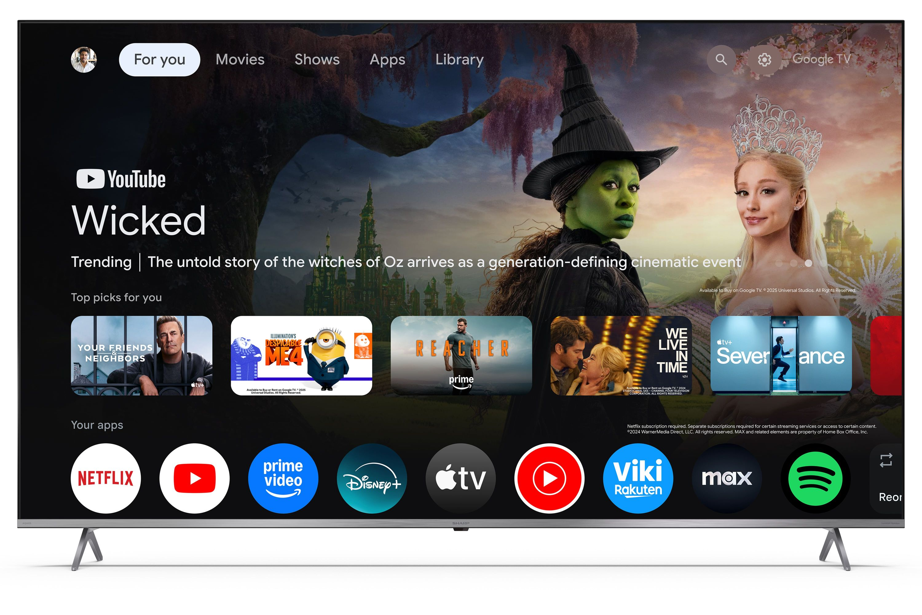Schermata principale di Google TV con film, app e una strega.