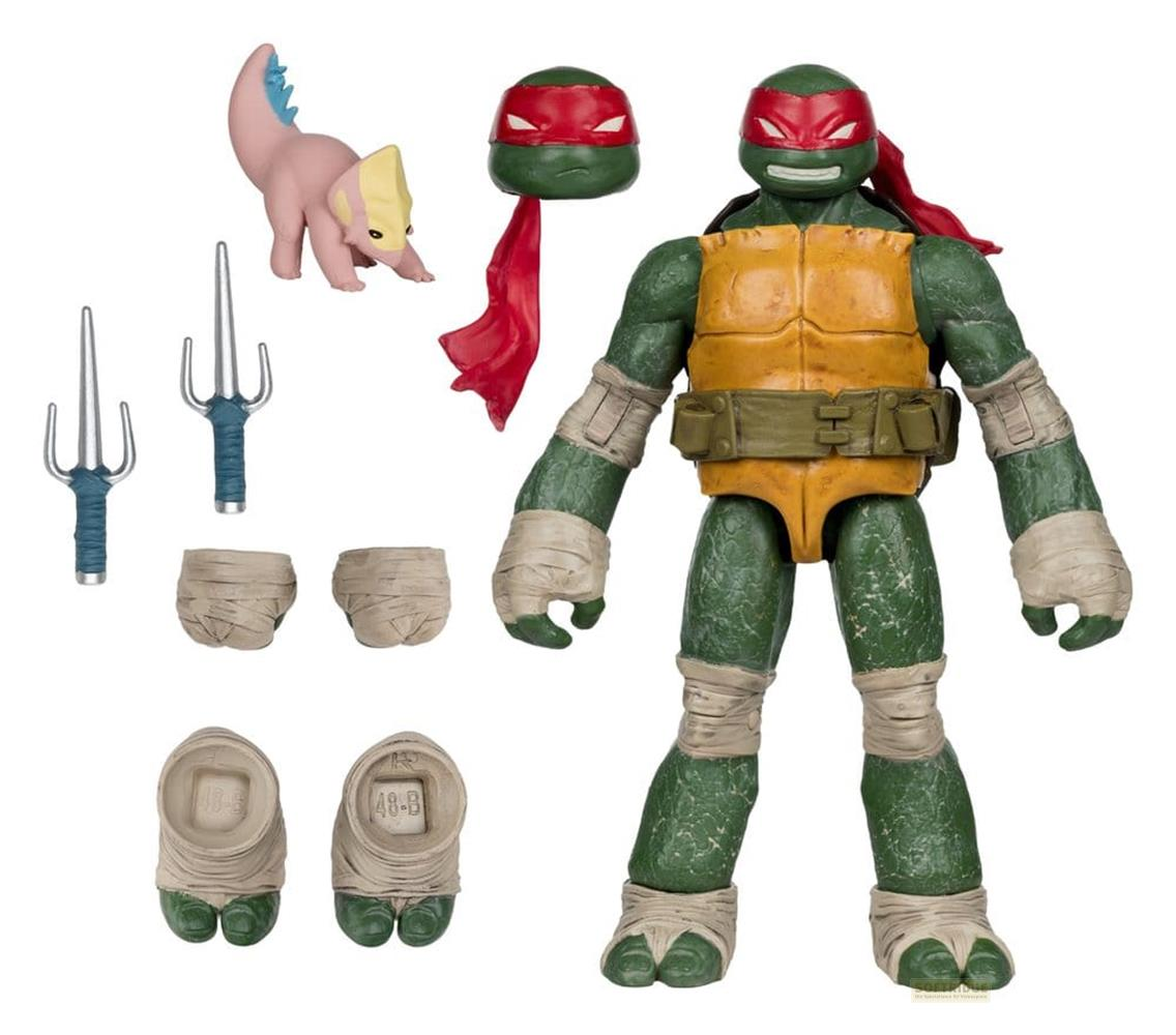 Action figure di Raphael con accessori: sai, una creatura e una testa di ricambio.