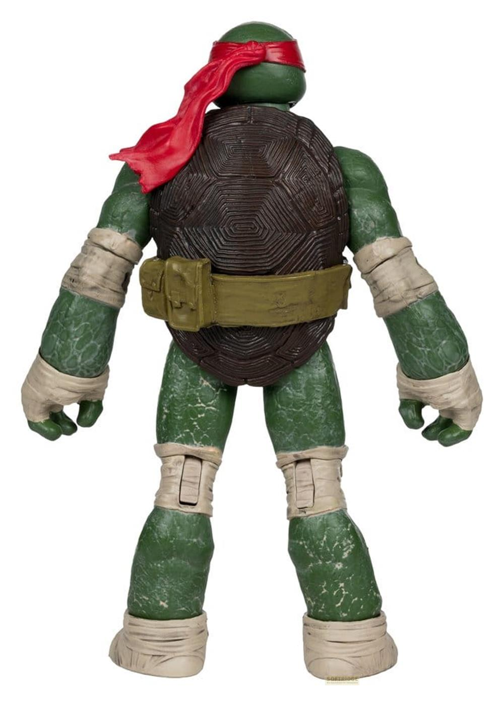 Figura di tartaruga verde con maschera rossa, guscio marrone e cintura verde.