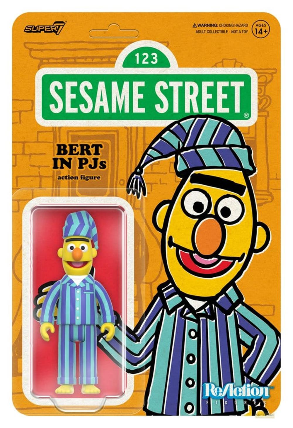 Bert als Actionfigur in gestreifter Schlafanzug-Verpackung auf gelbem Hintergrund.