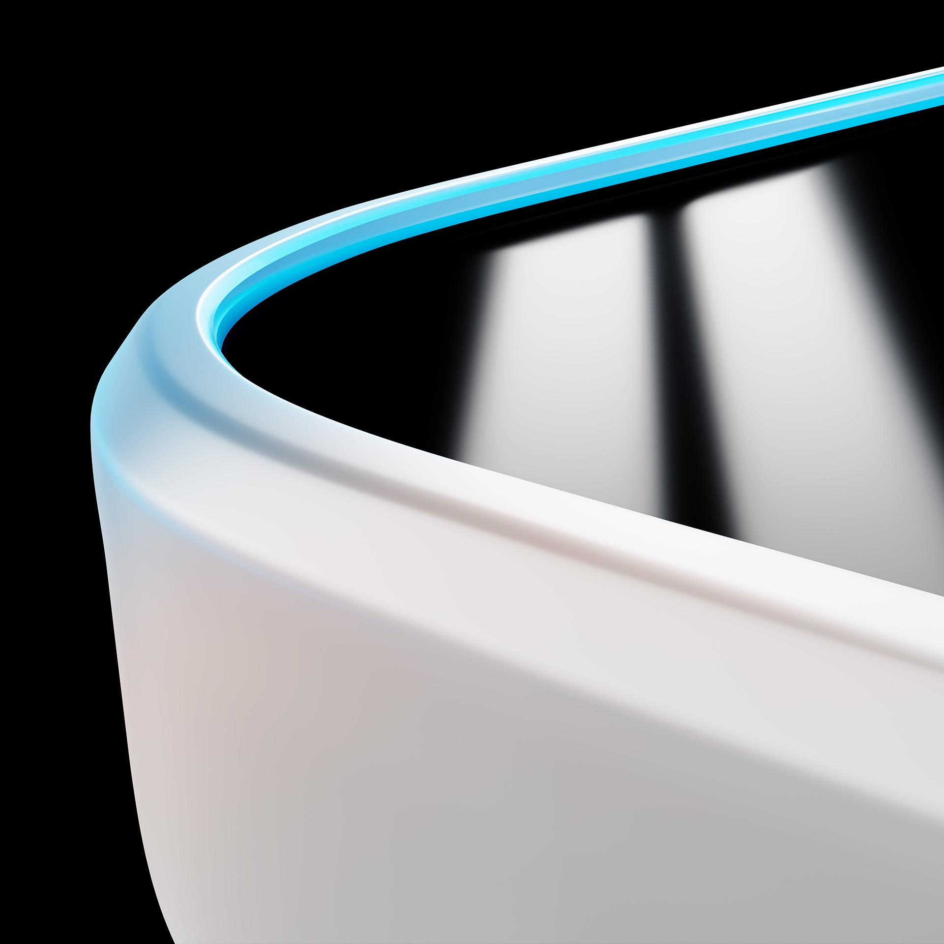 Abstrakcyjny zbliżenie białego i niebieskiego zakrzywionego kształtu na czarnym tle.