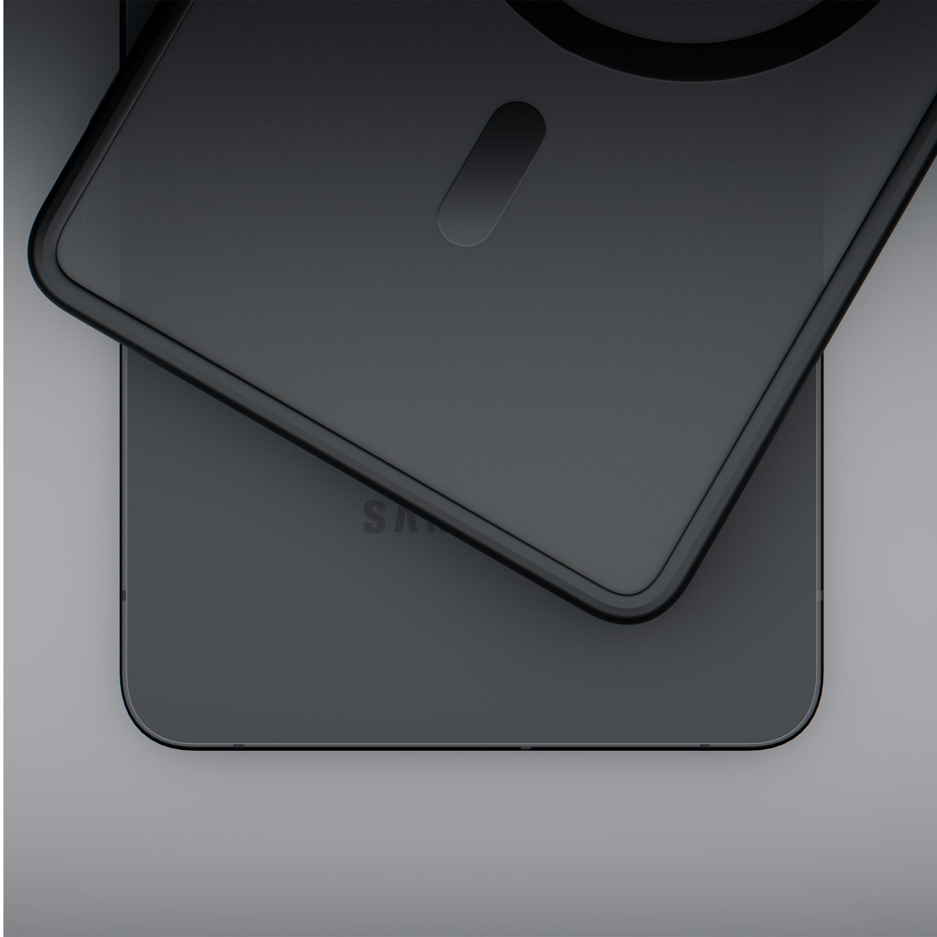 Czarny smartfon z etui leży na stole.