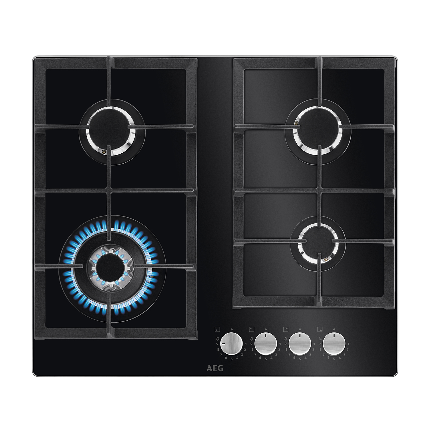 Czarna płyta grzewcza z czterema palnikami, jeden płonie