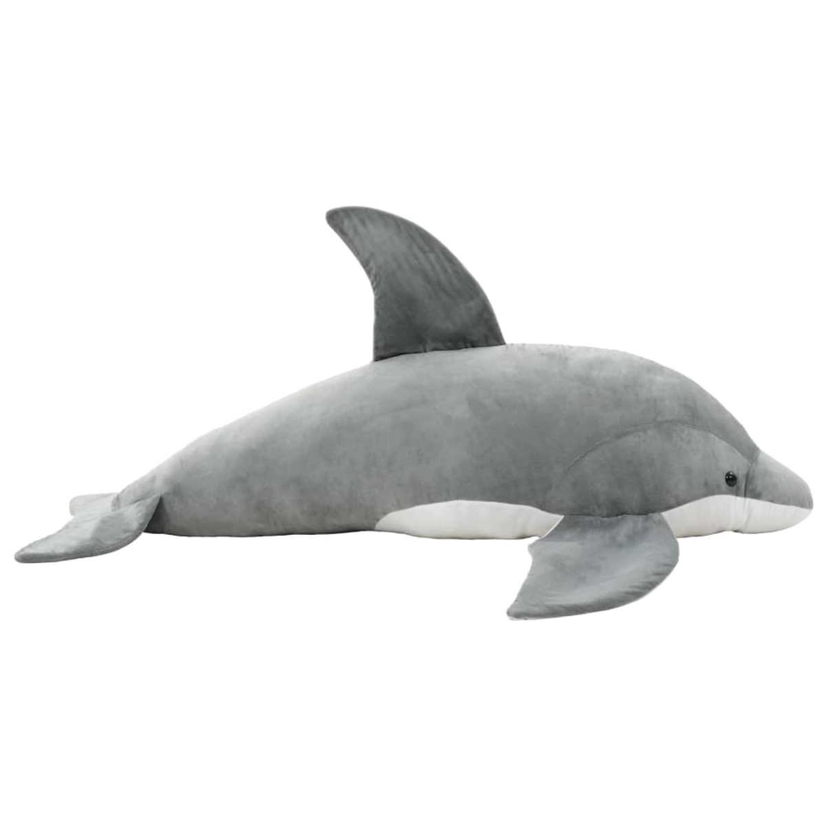 Ein graues Stofftier-Delfin liegt auf einer weißen Fläche.