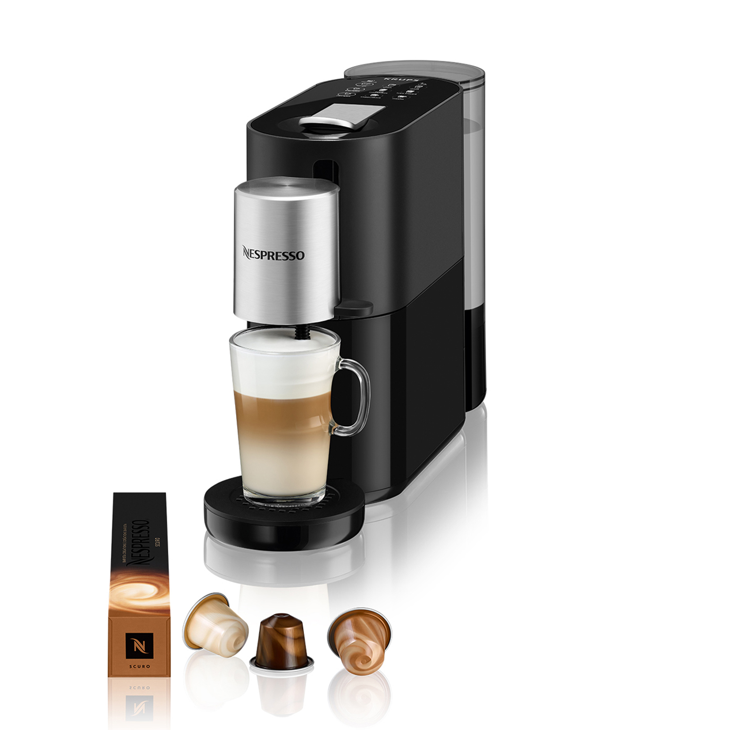 Kaffeemaschine mit Latte Macchiato, Kapseln und Verpackung.