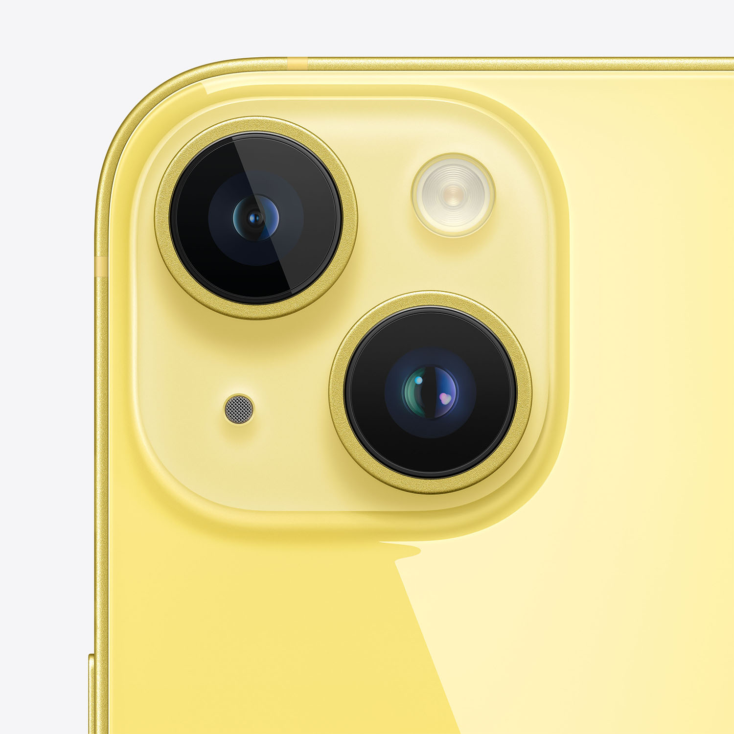 Primer plano de la cámara amarilla de un iPhone con dos lentes y flash.