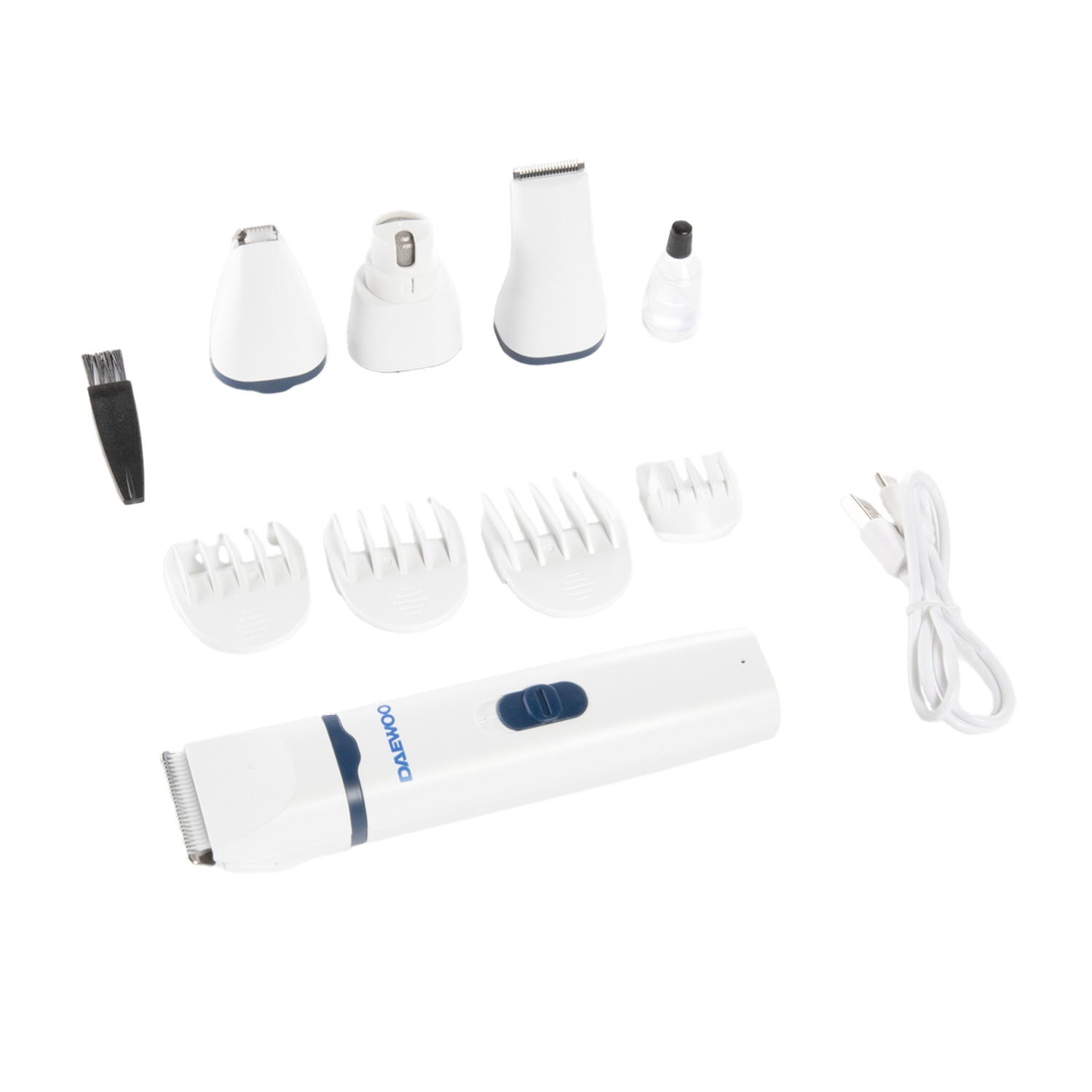 Un set di tagliacapelli bianco con accessori, spazzola, olio e cavo.