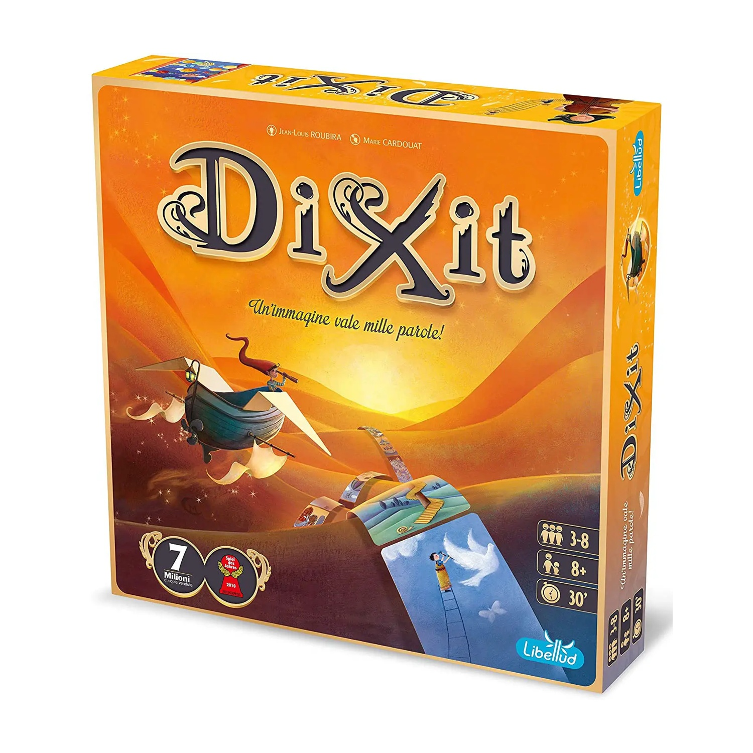 Die Dixit-Spielschachtel zeigt eine surreale Szene mit einem fliegenden Schiff bei Sonnenuntergang.