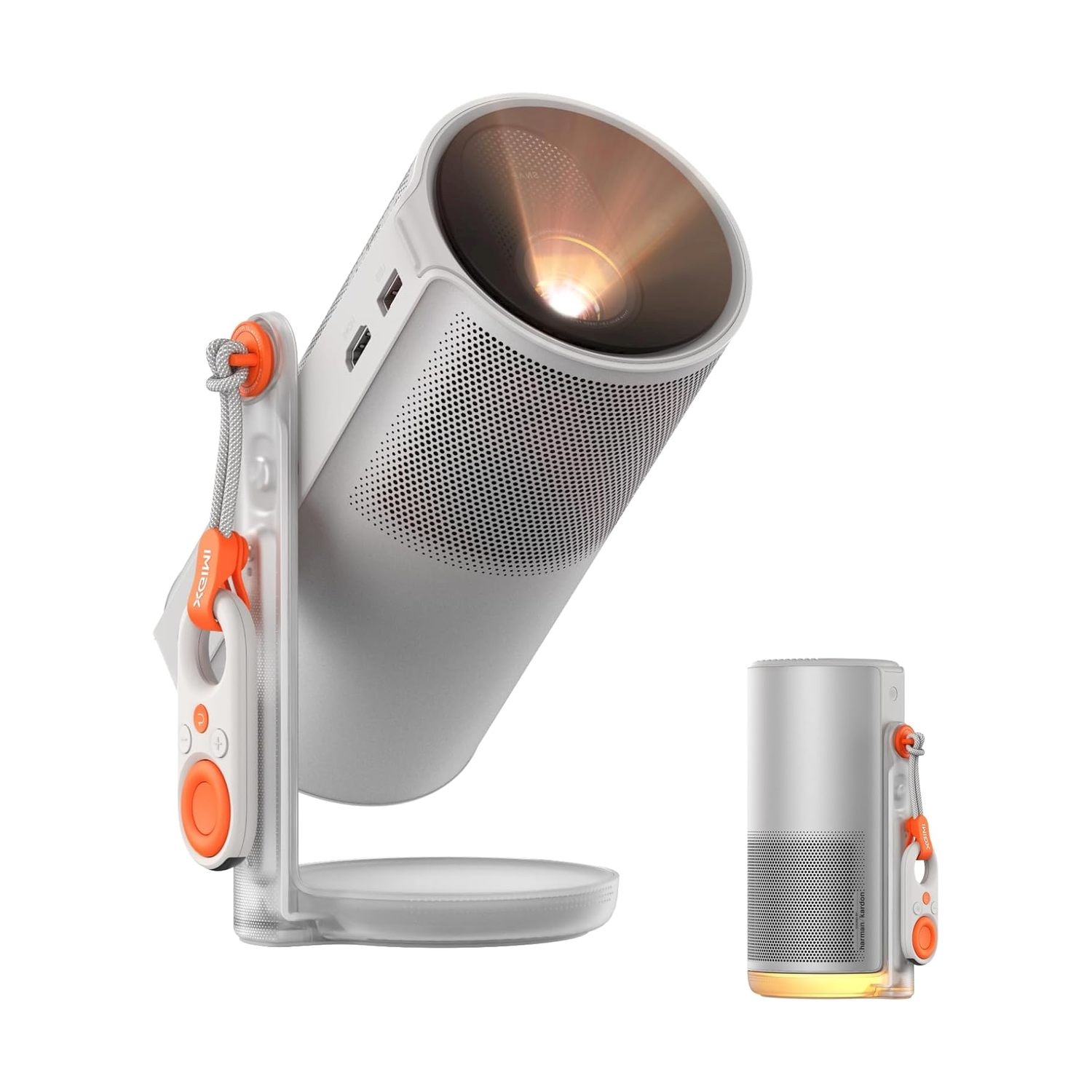 Een witte projector op een standaard met afstandsbediening en een tweede kleinere projector.