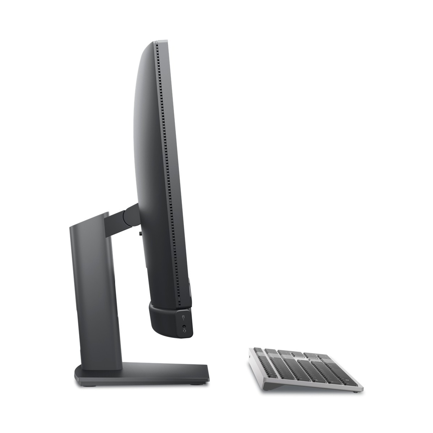 Un monitor di computer grigio con una tastiera su sfondo bianco.