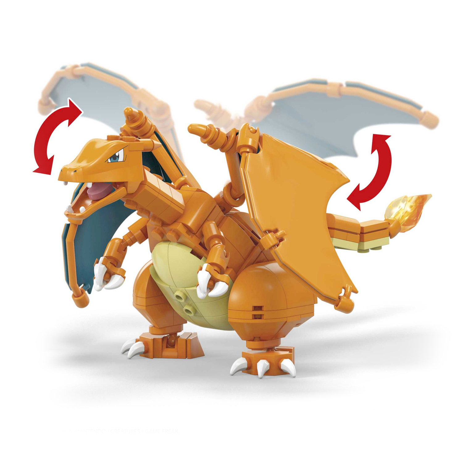 Pomarańczowy Lego Charizard ze skrzydłami i czerwonymi strzałkami wskazującymi ruch.