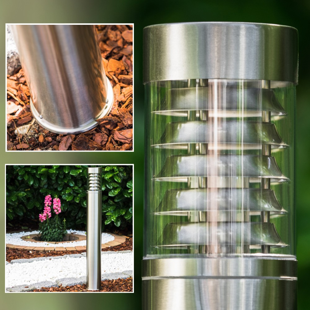 Moderner Edelstahl-Gartenstrahler mit Glaszylinder und Lamellen.