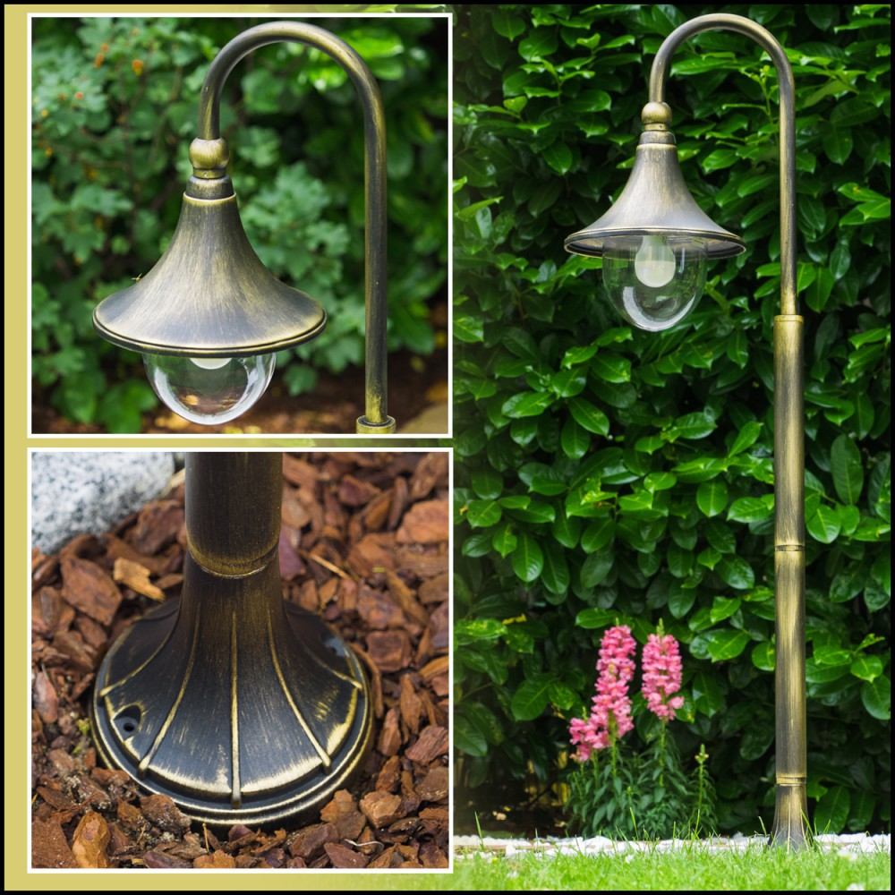 Gartenlaterne aus Metall mit Glaskuppel und Glühbirne, auf einem Sockel.
