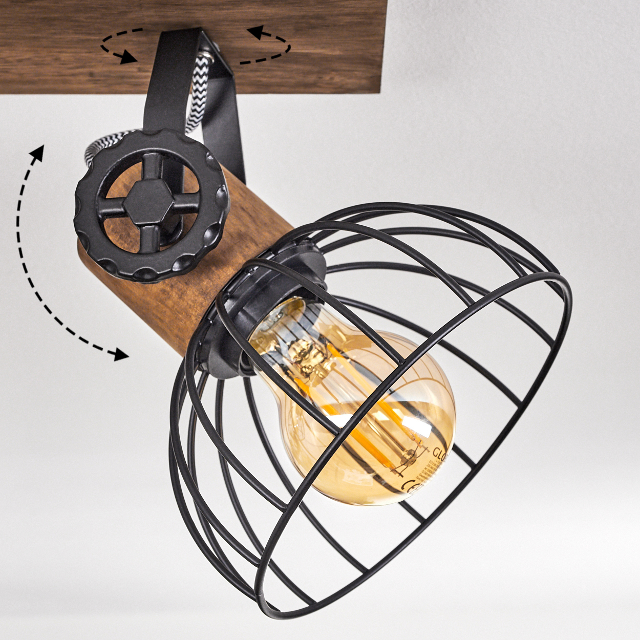 Industrielle Lampe mit Holzakzent, schwarzem Drahtkäfig und Edison-Glühbirne.