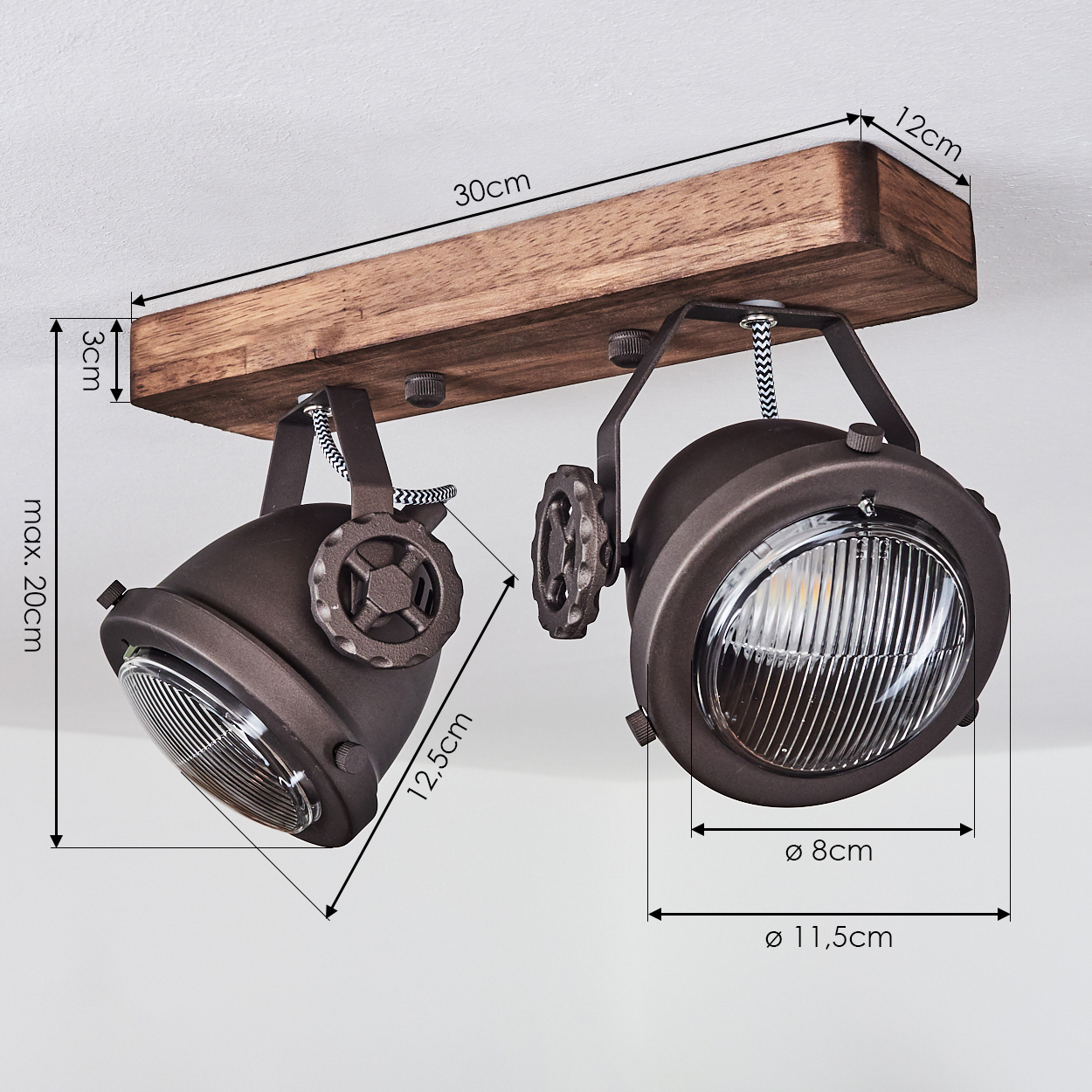 Deckenleuchte mit Holzsockel und zwei braunen Spots mit Ringen.
