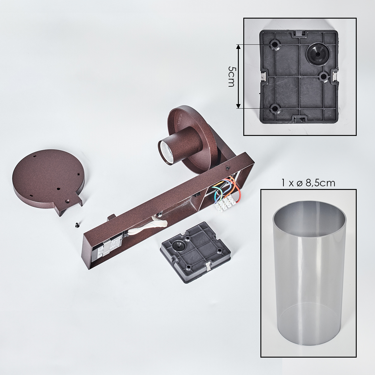 Teile einer braunen Lampe: Basis, Arm mit Kabeln, Glaszylinder und Montageplatte.